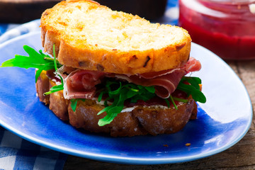 Cranberry  Prosciutto and cream  Cheese sandwich.