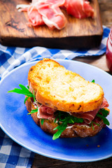 Cranberry  Prosciutto and cream  Cheese sandwich.