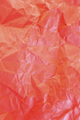 Fototapeta premium Crumpled red paper background