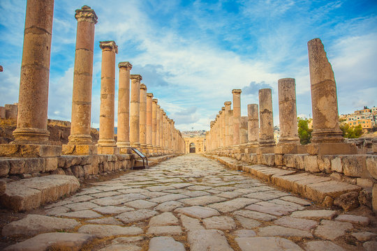 Ancient Roman ruins, walkway along the columns in Jerash, Jordan