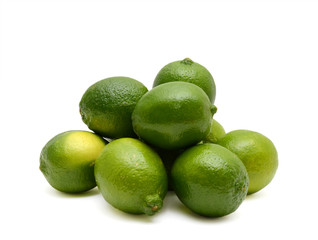 Fresh limes isolated on white background