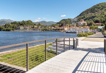 Naklejka premium Laveno Mombello, located in an natural gulf on the east bank of Lake Maggiore in province of Varese, Italy.