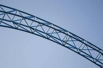 Metallic construction on the blue sky background