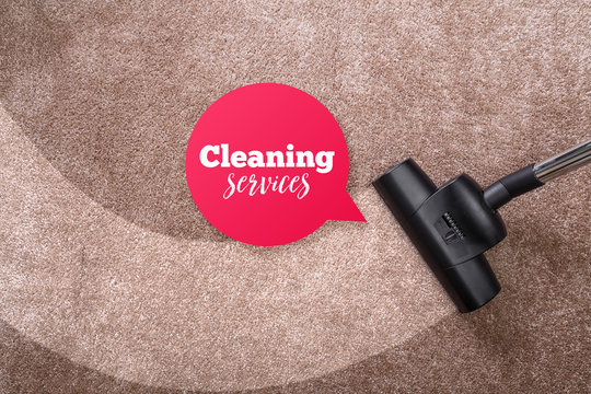 Vacuuming carpet with vacuum cleaner. Cleaning services speech bubble. Housework service. Close up of the head of a sweeper cleaning device.