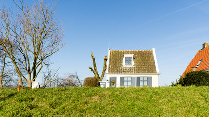 Fototapeta na wymiar One of the many dike houses in Durgerdam