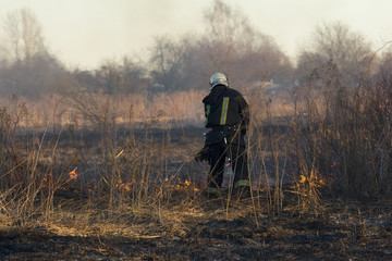 firefighters battle a wildfire