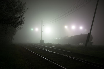 Gloomy railway in the fog, mist