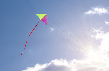 Kite flying in the sky among the clouds