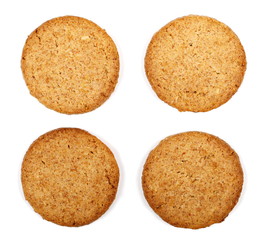 set round wholewheat biscuits with hazelnut isolated on white background