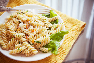 italian pasta fussili with cheese and vegetables
