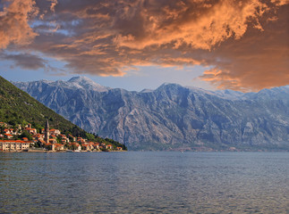 View of Perast and Kotor Bay, Montenegro. The old european city and mountain under the dramatic sky