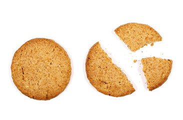 set round wholewheat biscuits with hazelnut isolated on white background