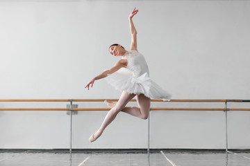 Fototapeta premium Female ballet dancer keep the rack in class