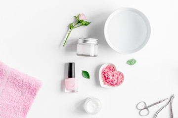 salt and cream for nail care in spa top view