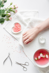 salt and cream for nail care in spa top view