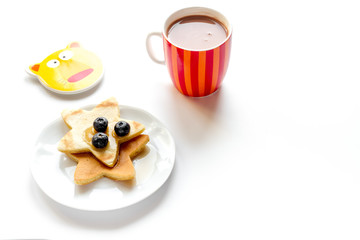 concept kid breakfast with pancake on white background