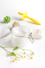 natural organic cosmetics with herbs for baby on white background