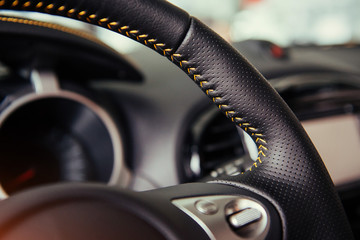 Modern car interior dashboard and steering wheel