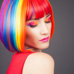 beautiful woman wearing colorful wig