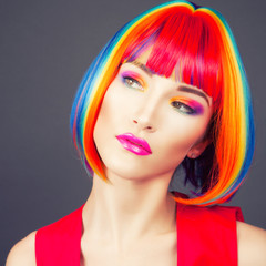 beautiful woman wearing colorful wig