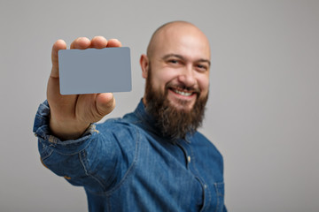 man with a credit card in hand