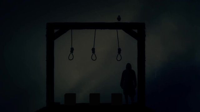 Executioner Standing in the Gallows Under a Storm