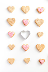 cookies for Valentine Day heartshaped white background top view pattern