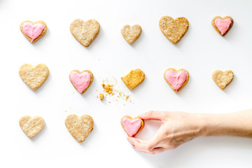 cookies for Valentine Day heartshaped white background top view pattern