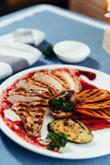 Grilled vegetables and chicken fillet. Traditional cuisine. Gril