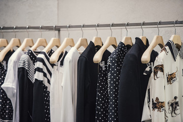 Women clothes on a rack in a fashion store
