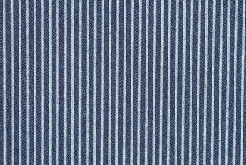 Dark blue denim with teal stripes fabric background