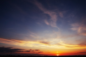 Fantastic sunset in the mountains cumulus clouds