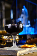 alcoholic cocktail with prunes and orange