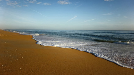 Beach with Sea Shore Line and Warm Sand