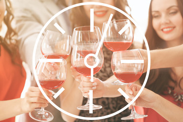 People toasting with glasses of red wine, closeup