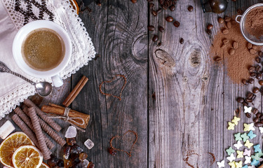 Grey wooden background with black coffee