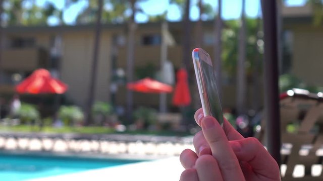 High quality video of woman using mobile phone in 4K