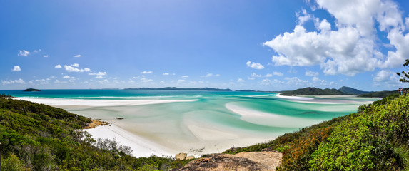 XXL panorama of Whitehaven Beach on Whitsunday Island in Queensland, Australia. The popular tourist destination is known for its pure white sands. Accessible from Airlie Beach, near Hamiltion Island.