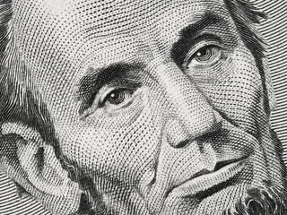 US President Abraham Abe Lincoln on USA five dollar bill extreme macro, 5 usd, United States of America money closeup