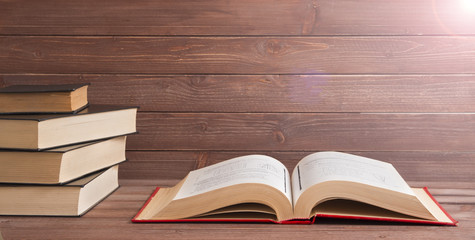 open book and stack on the table