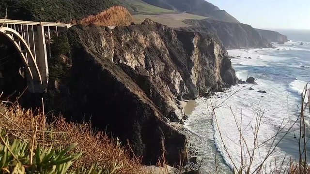 Zoom out pan timelapse of Bixby Creek Bridge, at Big sur coast, California, United states of america