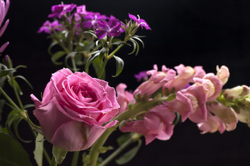 Pink rose in a bouquet.