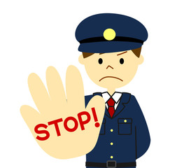 制止する警察官
