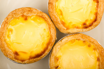 egg tart on white plate macro