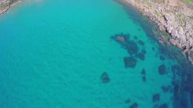 View from the air, sea, Malta. Picturesque seabed, underwater rocks and reefs,
turquoise sea water
