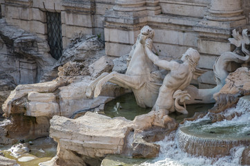 Fototapeta na wymiar The Trevi Fountain in Rome is the worlds largest Baroque fountain and a famous landmark of the city