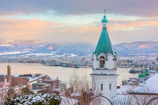 Hakodate, Japan orthodox church and cityscape.