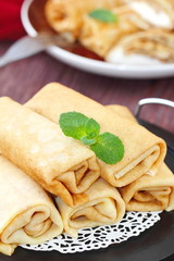 Rolled pancakes with cottage cheese