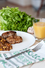 Buckwheat porridge with vegetables and meatballs