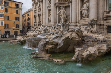 Fototapeta na wymiar Rome Italy 11 May 2014 The Trevi Fountain in Rome attracts large crowds of people and is the worlds largest Baroque fountain and a famous landmark of the city